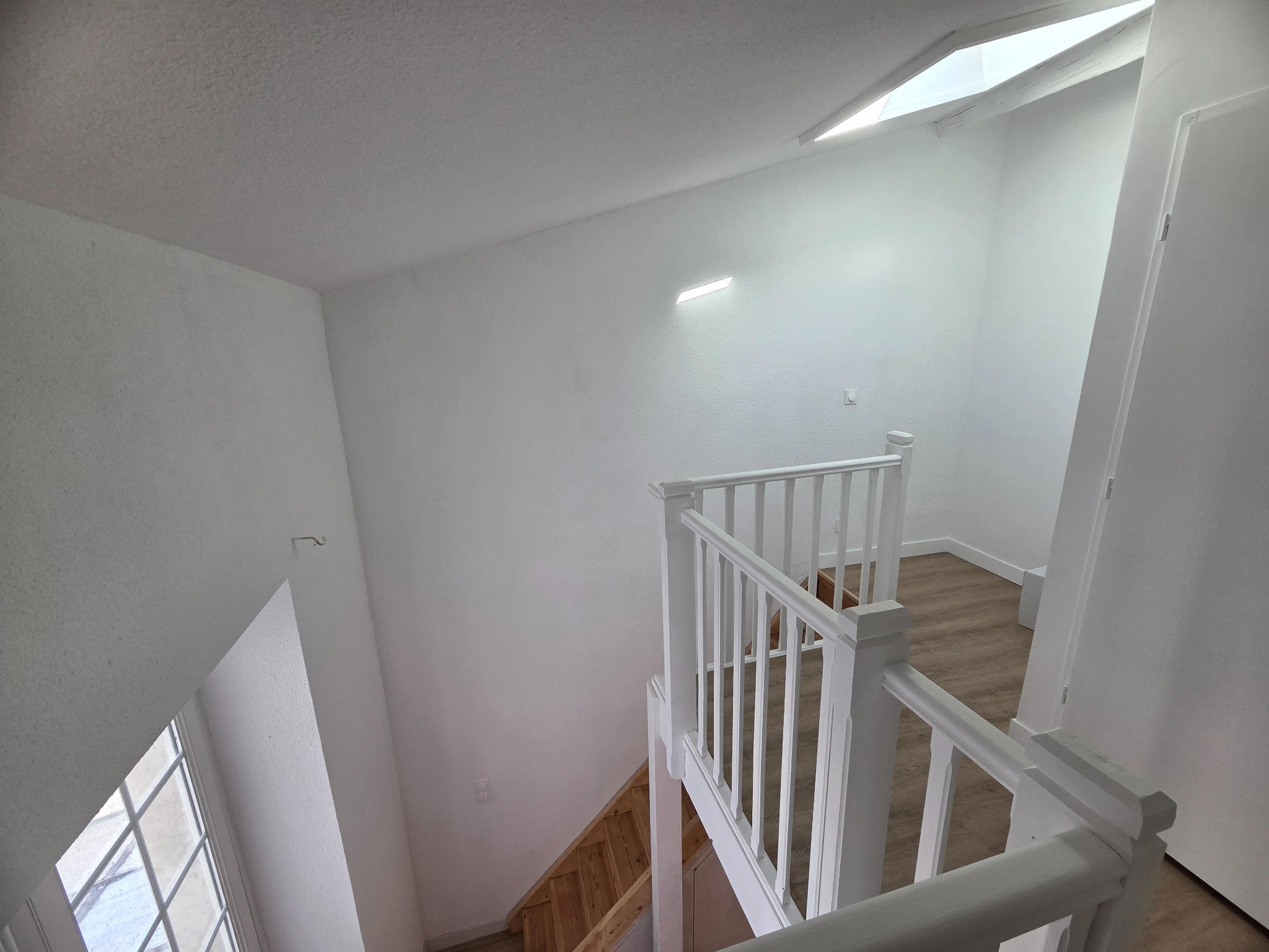 Mezzanine lumineuse après rénovation